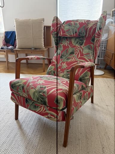 A high-back armchair featuring a vibrant tropical print upholstery and an exposed dark wood frame. The chair has a classic wingback design with a separate headrest cushion and straight, tapered legs. — 3D model