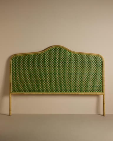 A headboard featuring a natural light wood or rattan frame with an irregularly curved top edge, encompassing a vibrant green woven cane panel. It is supported by two integrated vertical posts. — 3D model