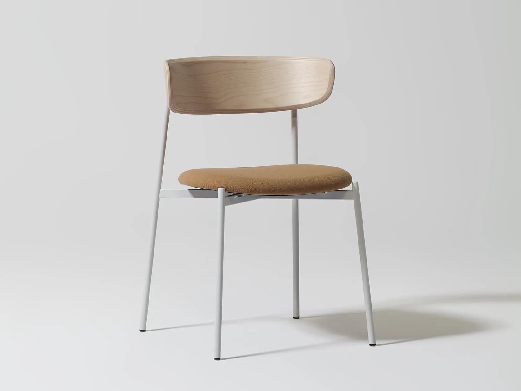 A modern dining chair with a bentwood backrest and a fabric-upholstered seat, supported by a slender, light gray metal frame. The backrest exhibits a natural wood grain pattern and a curved silhouette. The seat is padded and covered in a textured, tan-colored fabric. The frame consists of four thin, cylindrical legs connected by a horizontal support structure under the seat, all finished in a matte light gray. — 3D model