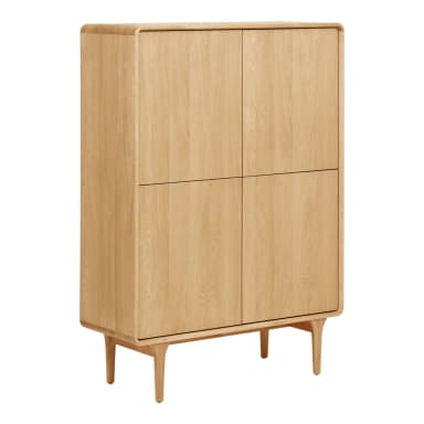A freestanding, light-toned wooden storage cabinet featuring four solid doors arranged in a two-by-two configuration. The cabinet has gently rounded corners on its top and sides and stands on four splayed, tapered legs that are integrated into a plinth-like base. — 3D model