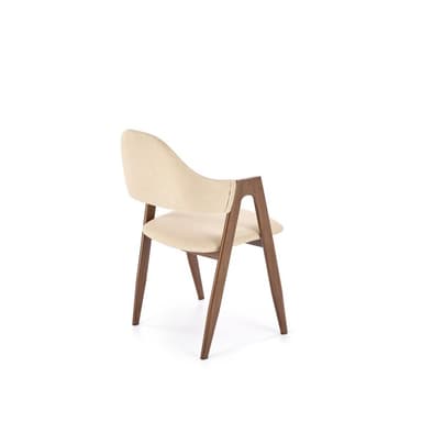 A modern armchair with a curved back and seat, upholstered in a textured light beige fabric. The frame consists of slender, dark-colored legs and arms, suggesting a minimalist design aesthetic. The chair is presented against a plain white background. — 3D model