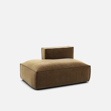 A modular sofa section with a low profile and plush cushioning. It features a single armrest or back support rising vertically from the seat, with a distinct seam line around the perimeter of the base and the seat cushion. The upholstery appears to be a textured fabric with a ribbed pattern. — 3D model