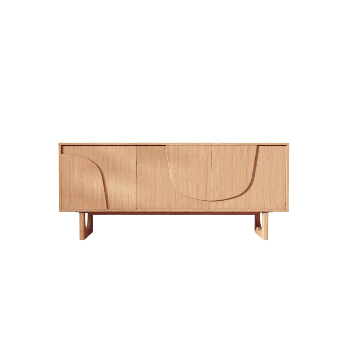 A modern, light-toned wooden sideboard featuring four cabinet doors. The two outer doors are adorned with carved or recessed abstract, curving lines that form an aesthetic pattern across the facade. It stands on two unique, sculptural wooden legs, one at each end, providing a stable and stylish base. — 3D model
