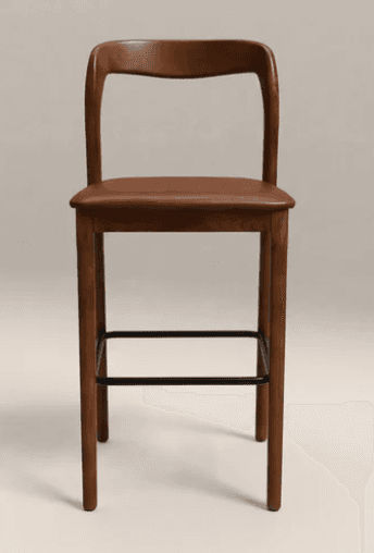 A bar stool featuring a solid wood frame with a warm brown finish, a gently curved backrest, and a rectangular padded seat upholstered in brown material. It has four tapered legs connected by a black metal footrest. — 3D model