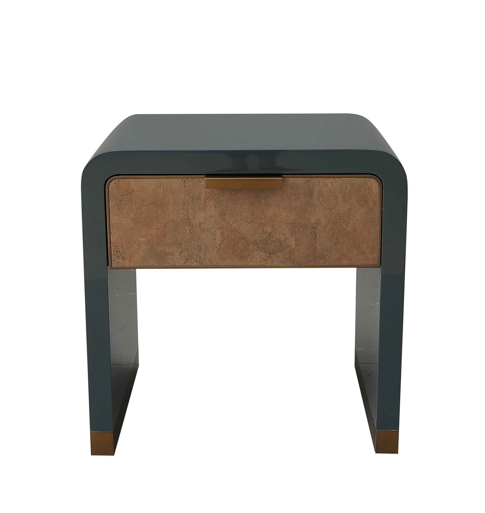 A modern nightstand with a dark gray lacquered finish and a single drawer. The drawer front features a textured, brass-colored material, and it is equipped with a minimalist brass handle. The structure has rounded corners, and the legs are integrated into the overall design, also featuring brass accents at the base. — 3D model