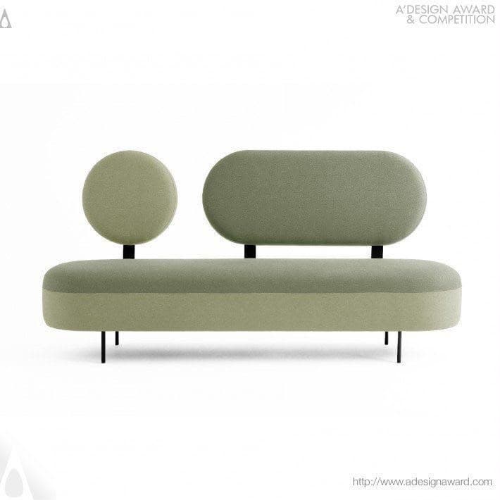 A contemporary two-seater bench with a sleek, minimalist design. It features a two-tone sage green upholstered seat base with a lighter lower section and a darker upper cushion. The most distinctive elements are its asymmetrical backrests: one perfectly circular and the other an elongated oval, both upholstered in the darker sage green and mounted independently. The entire unit is supported by slender, black metal legs, contributing to its modern aesthetic. — 3D model