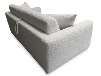 A modern sofa with a textured fabric upholstery. The sofa features a low profile with deep, plush cushions and rounded armrests. A distinctive design element is the integrated back cushion that curves upwards and outwards, creating a unique silhouette. The fabric has a boucle-like texture, giving it a soft and inviting appearance. The color is a neutral light gray or off-white. — 3D model