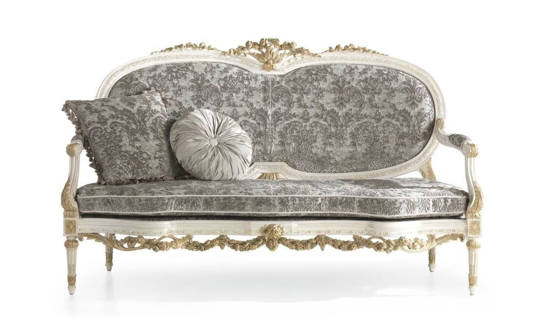 A highly ornate sofa with a carved wooden frame and upholstered seating and backrest. The frame is painted white with gold accents and features elaborate scrolling foliage motifs. The upholstery is a damask pattern in shades of gray and silver, with two decorative throw pillows. The sofa has a curved back and a distinct Rococo or Louis XV style. — 3D model