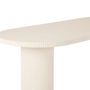 An off-white oval console table featuring a substantial top and two cylindrical pedestal bases, all uniformly finished with a vertical fluted texture. The design is monochromatic and minimalist, emphasizing form and texture. — 3D model