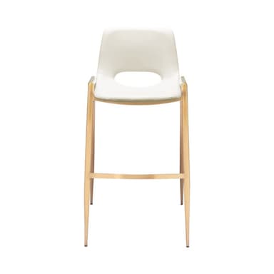 A contemporary bar stool featuring a subtly molded seat and backrest upholstered in an off-white or cream faux leather. The seat has a slight curvature for ergonomic comfort. It is supported by four slender, tapered metal legs in a gold or brass finish, connected by an integrated rectangular footrest for stability. The overall design is sleek and modern. — 3D model