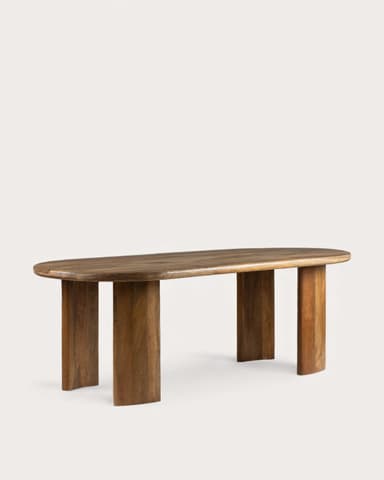 An elongated oval coffee table crafted from solid wood, featuring a smooth, curved tabletop and four thick, semi-cylindrical legs. The wood displays a rich, medium-brown tone with visible grain patterns, indicating its natural material. The design is contemporary, with rounded edges and a minimalist, sculptural aesthetic. — 3D model