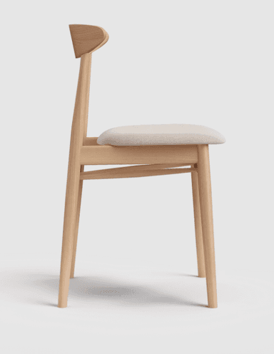 A minimalist Scandinavian-style dining chair crafted from light-toned solid wood with an upholstered seat. The chair features a gently curved backrest for ergonomic support and sleek, tapered legs. The design emphasizes natural materials and clean lines. — 3D model