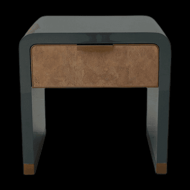 A modern nightstand with a dark gray lacquered finish and a single drawer. The drawer front features a textured, brass-colored material, and it is equipped with a minimalist brass handle. The structure has rounded corners, and the legs are integrated into the overall design, also featuring brass accents at the base. — 3D model