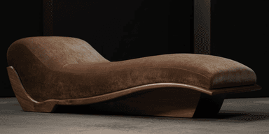 A modern chaise lounge featuring a distinctive ergonomic S-curve design. It consists of a plush, upholstered top in a brown, velvety fabric, supported by a sculptural wooden frame and base. The wood exhibits a dark, rich tone with a polished finish, highlighting its natural grain and elegant, flowing lines. The design emphasizes comfort and aesthetic form, suggesting a luxurious and contemporary piece. — 3D model