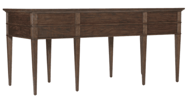 A traditional dark-stained wooden writing desk featuring a rectangular top, multiple drawers, and tapered fluted legs. It has a central kneehole space and is adorned with square brass pull handles featuring a Greek key motif. — 3D model