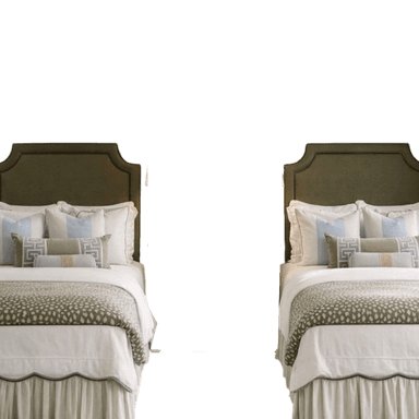 A fully dressed bed featuring an upholstered headboard with a shaped top and winged sides. The headboard is covered in a textured olive green fabric. The bed is adorned with white primary bedding, a patterned olive green and white throw blanket, and several decorative pillows in various sizes and patterns, including light blue, beige, and patterned grey bolsters. A ruffled bed skirt in a light beige/cream color completes the ensemble, concealing the bed frame. — 3D model
