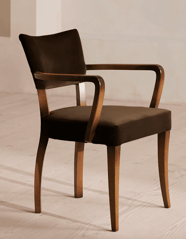 A wooden armchair with upholstered seat and backrest. The chair features curved armrests and four tapered legs. The upholstery is a dark brown fabric, and the wooden frame has a natural wood finish. — 3D model