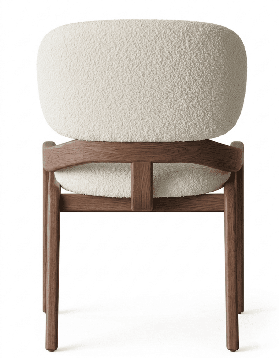 A modern armchair featuring a rounded, upholstered backrest and seat in a cream-colored textured fabric, supported by a dark wood frame. The frame has a minimalist design with curved arms and straight legs, showcasing the contrast between the soft textile and the solid wood. — 3D model