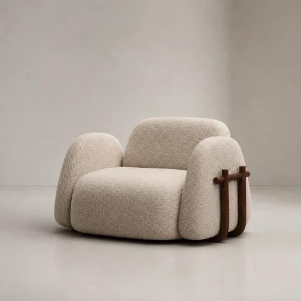 A contemporary lounge armchair featuring a unique, sculptural design. It is upholstered in a textured, off-white bouclé fabric, providing a soft and inviting appearance. The chair has generous, rounded forms for the seat, backrest, and armrests. A distinctive dark brown wooden structure wraps around the sides, supporting the armrests and adding a contrasting material element to the design. The overall aesthetic is organic and plush, designed for comfort and visual appeal. — 3D model
