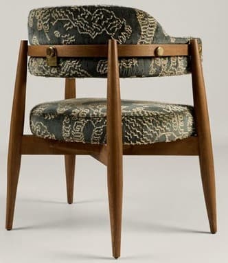 A mid-century style armchair featuring a distinctive barrel back design. The chair has an exposed dark wood frame, possibly walnut, with tapered legs. The seat and backrest are generously padded and upholstered in a dark green or teal fabric with intricate, light-colored embroidered patterns. — 3D model