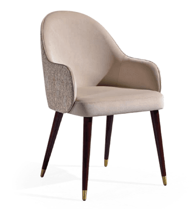 A single armchair with a curved backrest and armrests. The seat and back are upholstered in a smooth, light-colored fabric. The sides of the backrest feature a textured fabric in a neutral tone. The chair is supported by four tapered wooden legs, dark brown in color, with brass-colored caps at the feet. — 3D model