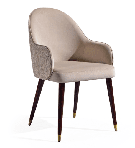 A single armchair with a curved backrest and armrests. The seat and back are upholstered in a smooth, light-colored fabric. The sides of the backrest feature a textured fabric in a neutral tone. The chair is supported by four tapered wooden legs, dark brown in color, with brass-colored caps at the feet. — 3D model