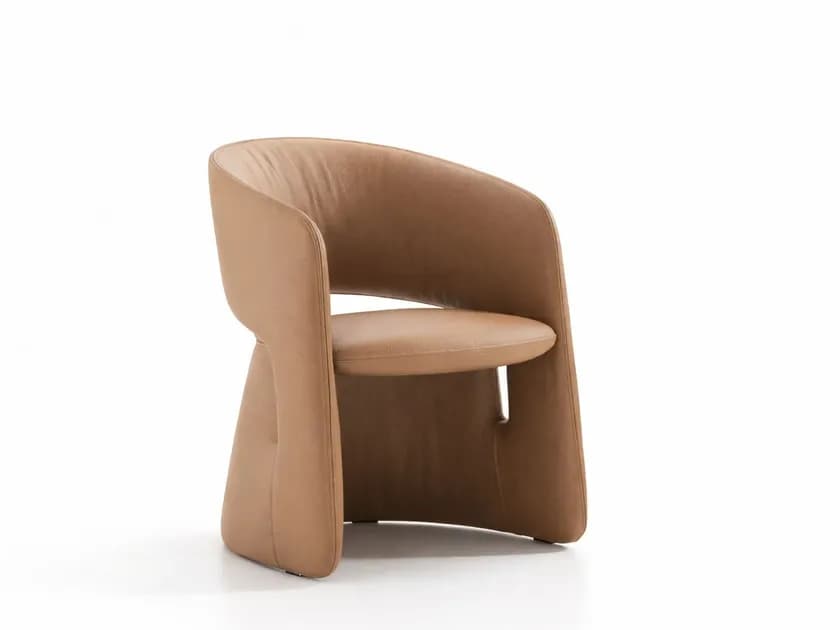 A modern, sculptural armchair featuring a continuous, curved form. It is fully upholstered in a light tan or camel-colored leather or faux leather, with a distinctive integrated base that blends seamlessly with the backrest and armrests. The seat cushion is subtly recessed within the shell. — 3D model