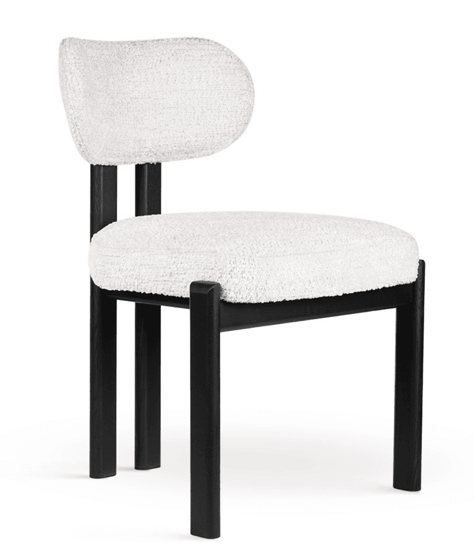 A modern chair with a black wooden frame and a curved, upholstered backrest and seat. The upholstery is a textured, boucle fabric in white. — 3D model