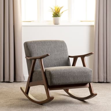 A wooden rocking chair with upholstered seating and backrest. The chair features curved wooden armrests and a frame constructed from dark wood. The rocking mechanism is integrated into the base with curved runners. — 3D model