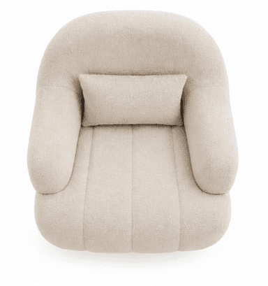 An upholstered armchair featuring a plush, rounded silhouette. The chair is covered in a textured cream-colored boucle fabric. It has integrated, softly curved arms and a continuous backrest. The seat base includes subtle vertical channel tufting. The chair rests on short, splayed dark wood legs. A matching rectangular lumbar pillow is included. — 3D model