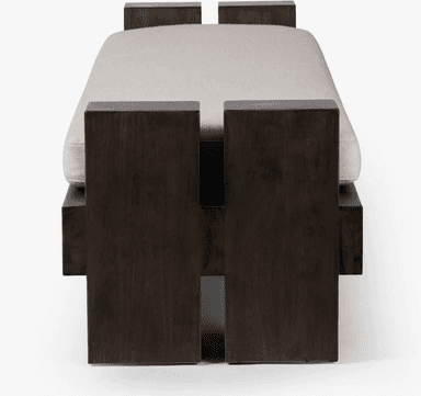 A contemporary bench with a dark wood frame and a light-colored upholstered seat. The frame features a blocky, geometric design with staggered vertical elements at each end, creating a robust and architectural appearance. The seat is a simple rectangular cushion, providing a contrast in texture and color to the solid wood base. The bench is presented against a plain white background, highlighting its form and details. — 3D model