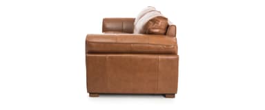 A two-seater sofa upholstered in rich camel-colored leather, featuring plush, relaxed cushions, rolled arms, and subtle wooden block feet. — 3D model