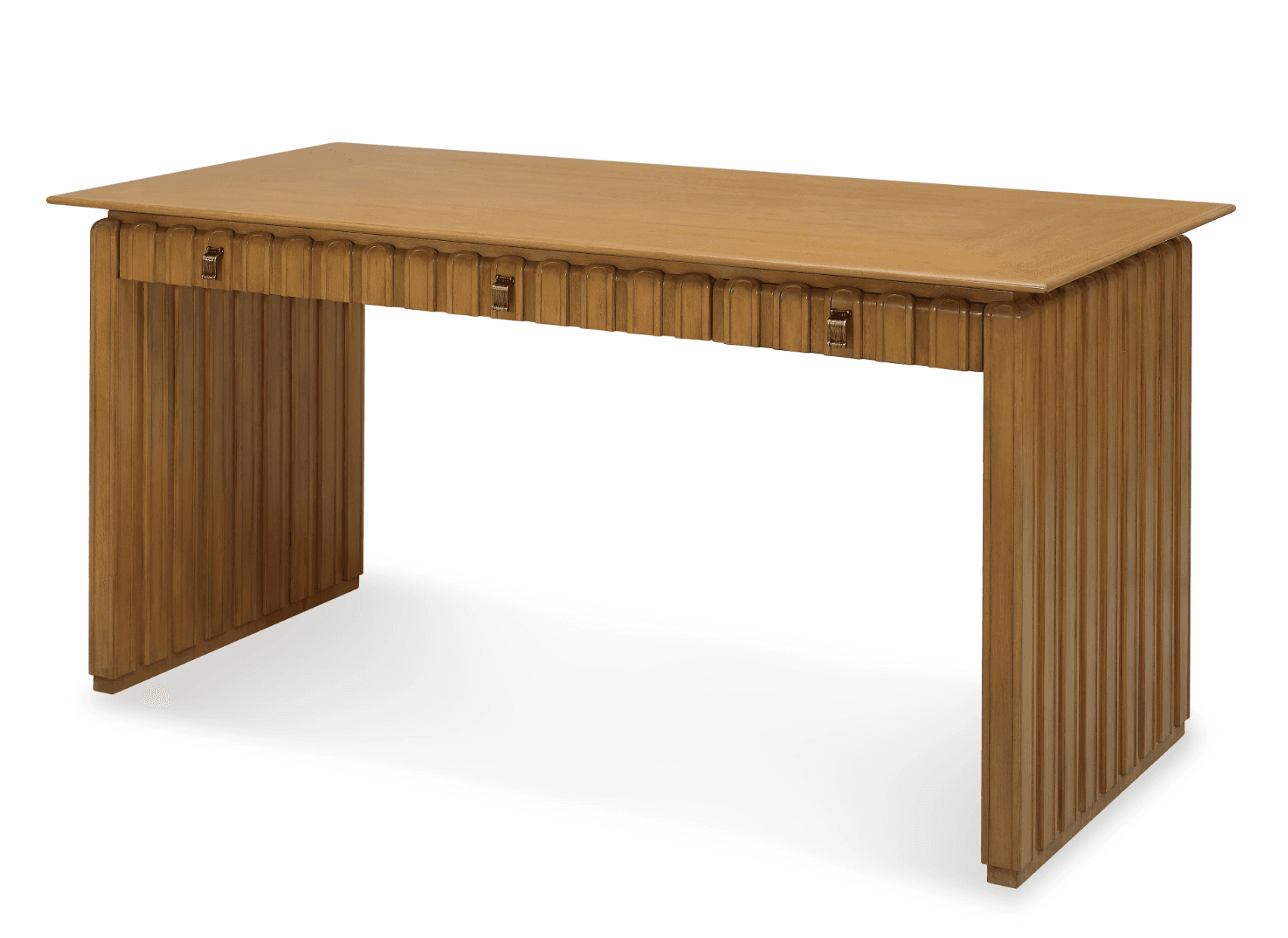 A rectangular wooden desk featuring a fluted or reeded design across its front and side panels. It includes two shallow drawers with distinctive brass-toned hardware. The top is smooth and the overall color is a natural, light wood tone. — 3D model