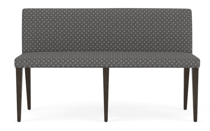 A modern upholstered dining bench featuring a straight backrest and seat, covered in a dark gray fabric with a repeating light geometric pattern. The bench is supported by four dark-stained, tapered wooden legs. — 3D model