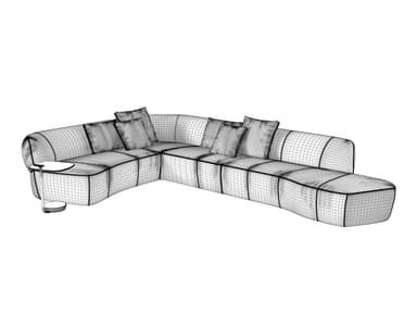 A large, light-colored modular sectional sofa composed of multiple interconnected units. It features a distinctive curved armrest section, several straight seating modules with integrated backrests, and a extended chaise lounge-style end unit. The sofa is upholstered in a textured, light-toned fabric and includes several loose throw pillows for added comfort. A small, black C-shaped side table with a round base is positioned next to the curved armrest section. — 3D model