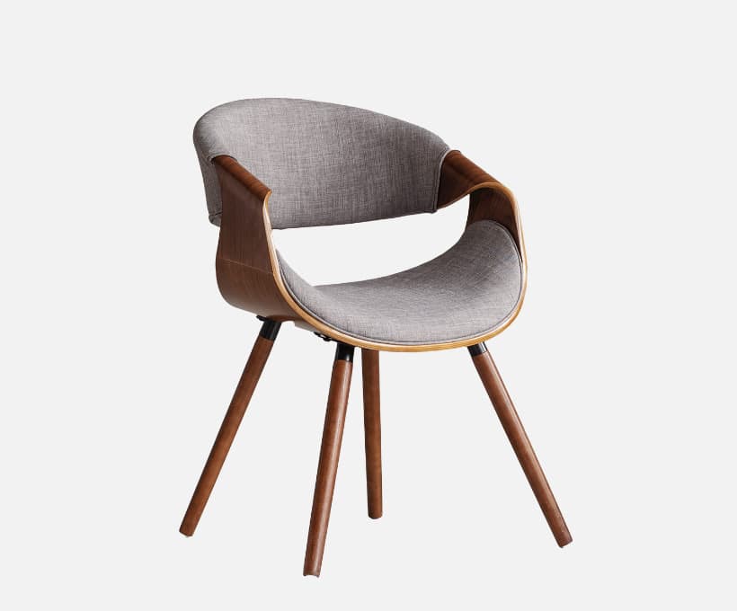 A modern accent chair featuring a molded seat and back upholstered in grey textured fabric. The chair has integrated armrests and a curved wooden frame. It is supported by four tapered wooden legs with a dark brown finish. — 3D model