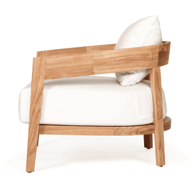 A modern outdoor lounge chair featuring a sturdy teak wood frame and plush white cushions. The design emphasizes clean lines and natural materials, suitable for a contemporary outdoor living space. — 3D model