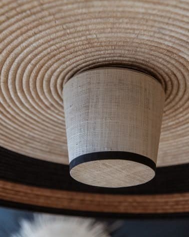 A close-up image of two pendant lights, each featuring a bell-shaped natural wood canopy from which a woven natural fiber shade hangs. The shades are multi-toned with alternating bands of light beige/natural and black woven material, creating a striped pattern. The wooden canopies exhibit a visible grain, and the black electrical cord is visible emerging from the top of the canopy. — 3D model