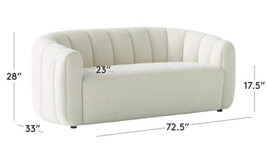 A contemporary loveseat upholstered in textured bouclé fabric, featuring a rounded silhouette with channel tufting on the back and arms. — 3D model
