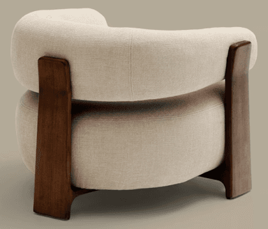 A modern armchair featuring a distinctly rounded and organic form. The upholstery is a textured, neutral-toned fabric, contrasting with the dark, solid wood frame. The frame has a minimalist design with prominent vertical elements for armrests and legs, creating a sculptural appearance. — 3D model