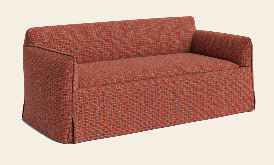 An upholstered loveseat featuring a textured, multi-tone fabric in predominant shades of red and orange. It has clean, straight track arms and a full skirted base that conceals the legs. The back and seat cushions appear integrated with the frame, providing a streamlined profile. The fabric has a basketweave-like texture, adding depth to its appearance. — 3D model