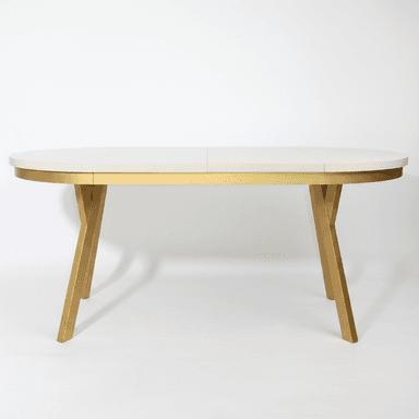 An oval-shaped dining table with a cream-colored top and a metallic gold base. The table top appears to be segmented, suggesting it might be extendable. The base consists of two angled, V-shaped legs that meet in the center, providing a modern and somewhat sculptural aesthetic. — 3D model