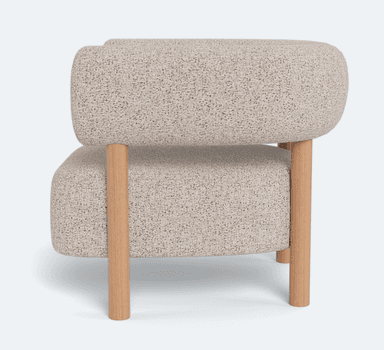 A single accent chair featuring a rounded, enveloping backrest and seat upholstered in a textured, light-colored boucle or similar fabric. The chair is supported by a minimalist frame constructed from light-toned wood, with four cylindrical legs extending from the base and two upright supports that integrate into the armrests and connect to the backrest. The design blends soft, organic curves with a clean, natural material aesthetic. — 3D model