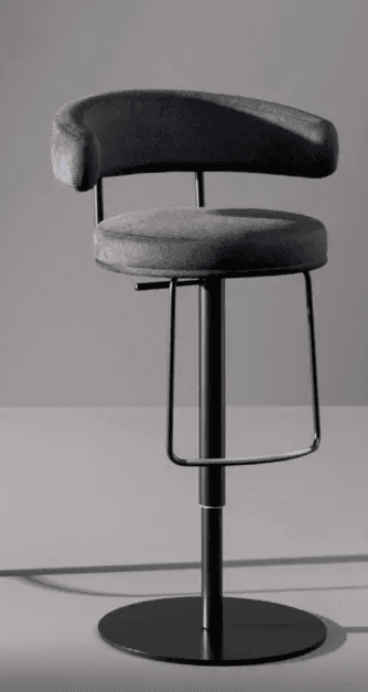 A modern, height-adjustable bar stool featuring a dark grey velvet upholstered seat and a curved, integrated backrest. It has a sturdy black metal frame with a built-in footrest and sits atop a central pedestal base with a wide, circular disc for stability. The stool includes a swivel and gas lift mechanism for height adjustment. — 3D model