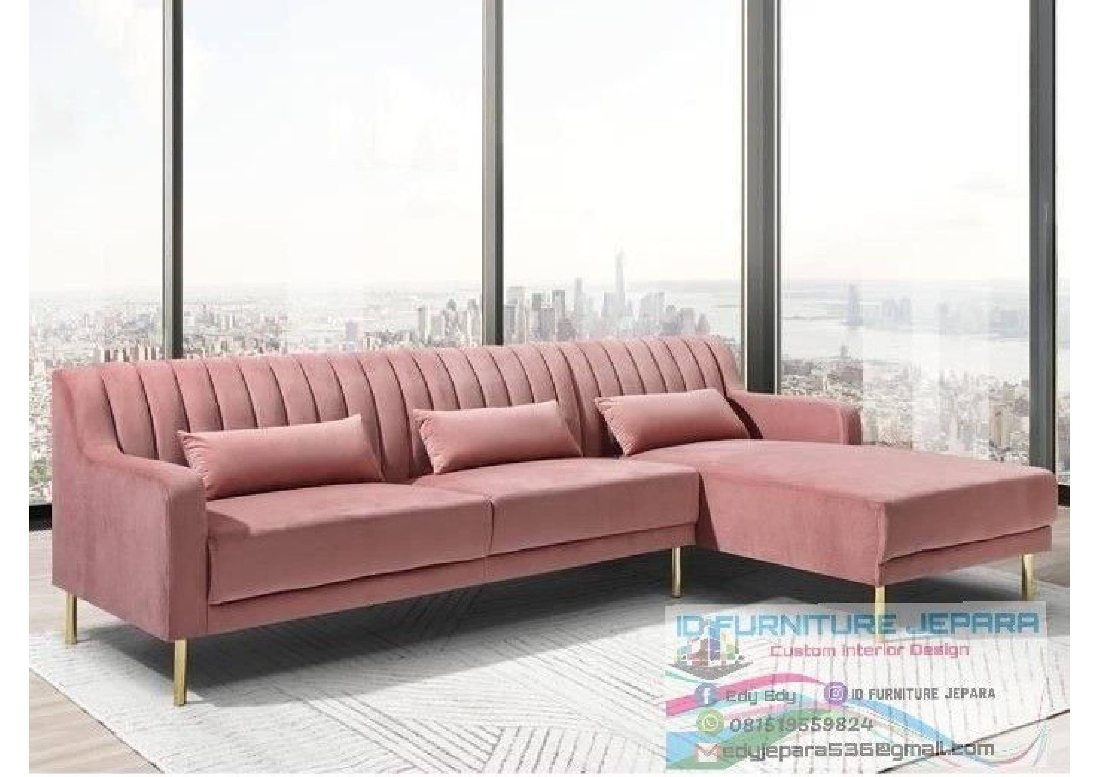 A modern right-hand facing sectional sofa upholstered in a blush pink velvet fabric. It features vertical channel tufting on the backrest, clean armrests, and rests on slender, tapered brass-finished metal legs. The sectional includes three matching rectangular lumbar support pillows. — 3D model