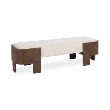 A close-up view of a modern upholstered bench, featuring a rectangular, cushioned top covered in a light, textured cream fabric. The base and integrated legs are constructed from a rich, distressed brown leather or faux leather material, designed with a distinct L-shaped structure at the corners that provides sturdy support and a contemporary aesthetic. — 3D model