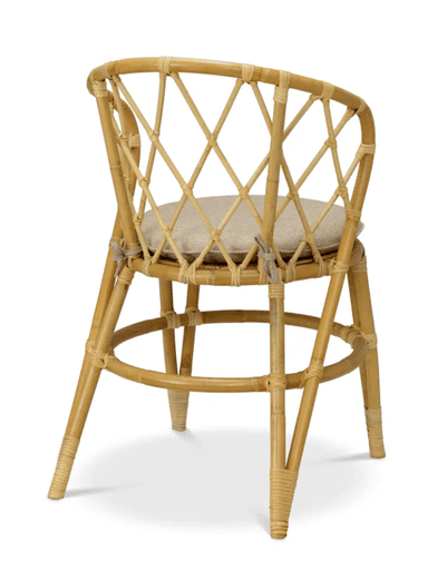 A light-colored bamboo bar stool with a woven backrest and a padded seat. The stool features four legs connected by a circular footrest. The bamboo structure is bound with natural twine at various joints and decorative elements. — 3D model