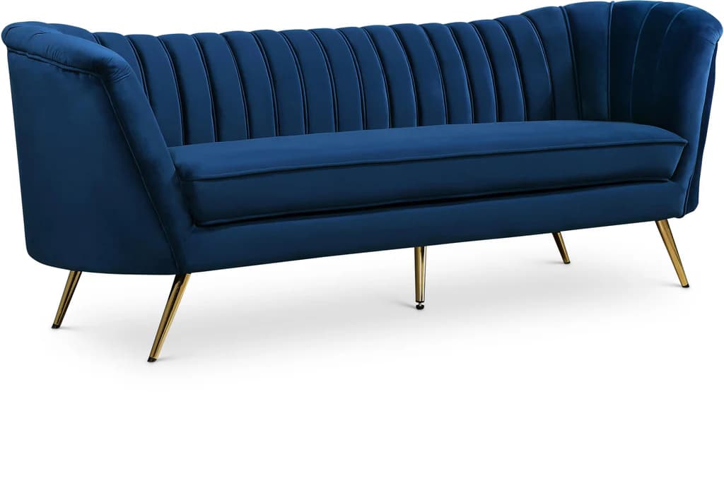 A contemporary channel-tufted loveseat upholstered in rich navy blue velvet, supported by slender golden brass legs. — 3D model