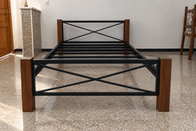 A contemporary bed frame featuring a black metal structure with a slatted base, complemented by natural wood corner posts on both the headboard and footboard. The headboard and footboard also incorporate a distinctive X-brace design in metal. — 3D model