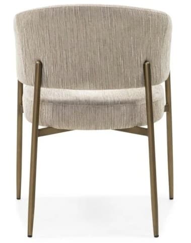 A contemporary armchair with a gently curved backrest and integrated armrests. The seat and back are upholstered in a textured, neutral-toned fabric. It is supported by slender, metallic legs with a brass or bronze finish. — 3D model